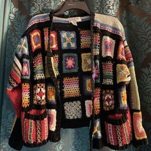 Ladies knitted multi color sweater.